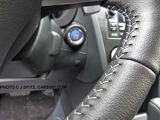 close-up of the Subaru Crosstrek Hybrid steering wheel- leather wrapped with silver stitching