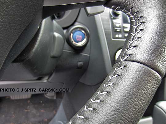 close-up of the Subaru Crosstrek Hybrid steering wheel- leather wrapped with silver stitching