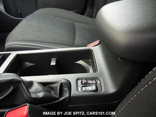2015 Crosstrek console with all weather package heated seat buttons, and armrest slid to rear