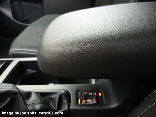 2015 Crosstrek center console sliding armrest, shown slid forward