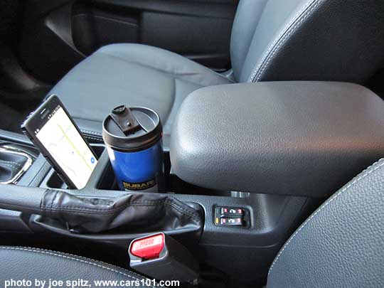 2015 Crosstrek center console sliding armrest, shown slid forward