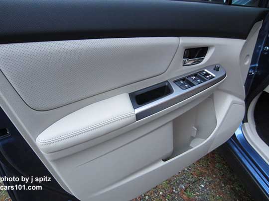2015 Crosstrek front drivers door interior panel, warm ivory color shown