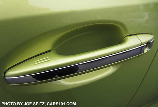 2015 Subaru Crosstrek Hybrd front passenger door handle with chrome strip.