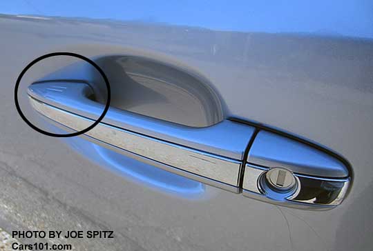 Only the Hybrids have the chrome strip door handle with the keyless access hotspot