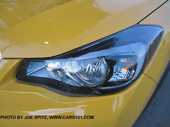 front headlight with black inner surround, 2015 Subaru Sunrise Yellow Crosstrek Premium Special Edition