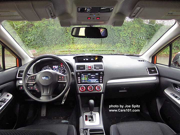 interior of 2015 Crosstrek Premium with optional Eyesight system. Notice the silver shift surround, Eyesight cameras by rear view mirror