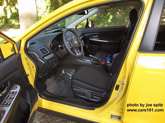 black cloth interior of the 2015 Subaru Sunrise Yellow Crosstrek Premium Special Edition