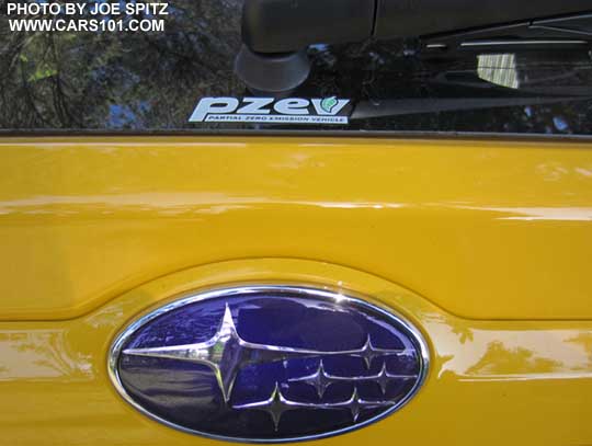 2015 Subaru Sunrise Yellow Crosstrek Premium Special Edition rear Subaru Pleidies and PZEV logos