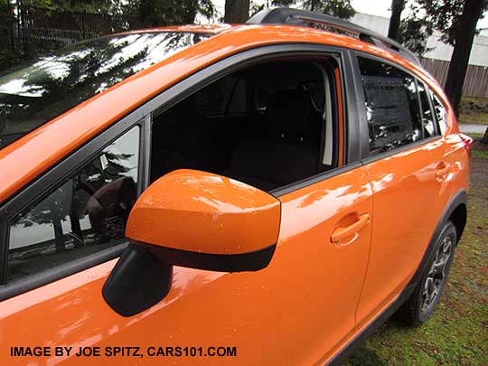 Crosstrek Premium outside mirror, painted tangerine orange.