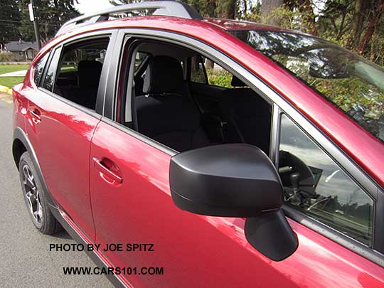 2015 Crosstrek 2.0i base model black unpainted outside mirror, venetian red car shown