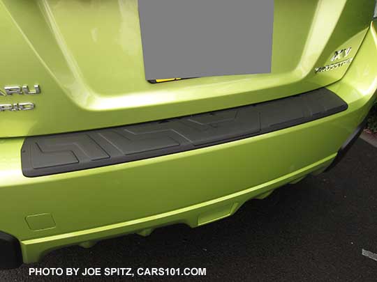 2015 Crosstrek with the optional rear bumper cover step pad, plasma green Hybrid shown
