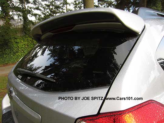 2015 Subaru Crosstrek optional rear spoiler. ice silver shown. Not available on Hybrids