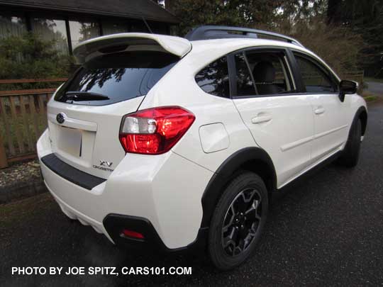 2015 Crosstrek rear view, crystal white, optioanl rear spoiler 15 crosstrek- optional rear spoiler, rear bumper cover, side moldings. Crystal white