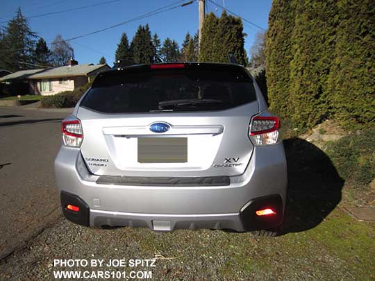 2015 Subaru XV Crosstrek Hybrid rear view, optional rear bumper cover, Quartz Blue shown
