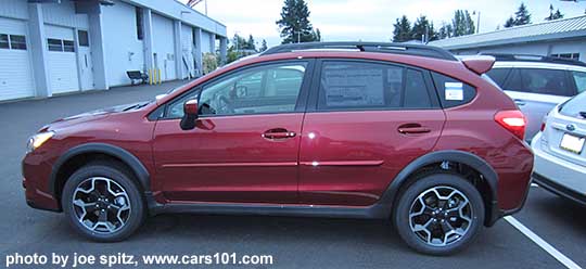 venetian red 2015 Subaru Crosstrek with optional side moldings and rear spoiler