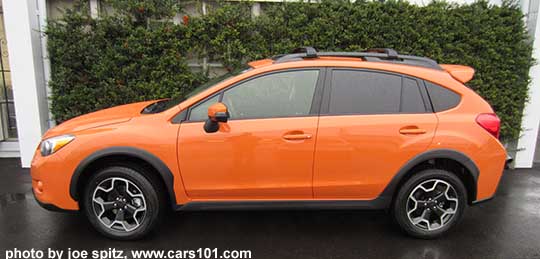 side view Tangerine orange 2015 Crosstrek with optional rear spoiler