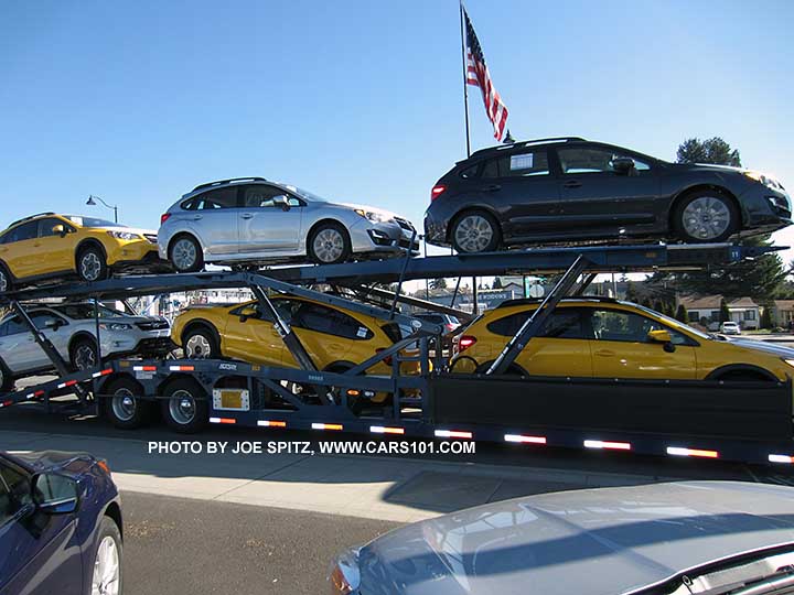 2015 Subaru Sunrise Yellow Crosstrek Premium Special Editions arriving on a car transporter, March 7, 2015