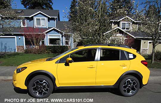 side view 2015 Subaru Crosstrek Premium Special Edition, Sunrise Yellow color.