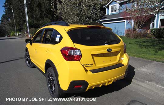 rear view 2015 Subaru Crosstrek Premium Special Edition, Sunrise Yellow color.