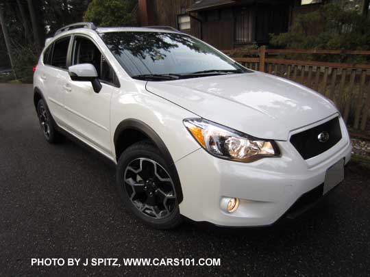 2015 crystal white Subaru Crosstrek with optional sport grill and body side moldings
