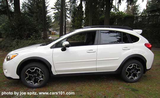side view 2015 crystal white Subaru Crosstrek with optional sport grill and body side moldings