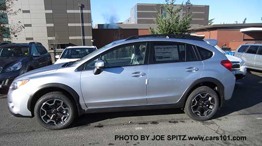 side view 2015 ice silver Subaru Crosstrek, with optional rear spoiler