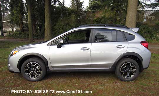 side view 2015 ice silver Subaru Crosstrek, with optional rear spoiler