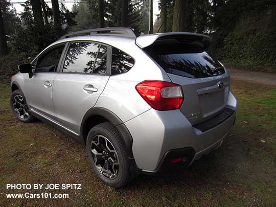 rear view 2015 ice silver Subaru Crosstrek, with optional rear spoiler