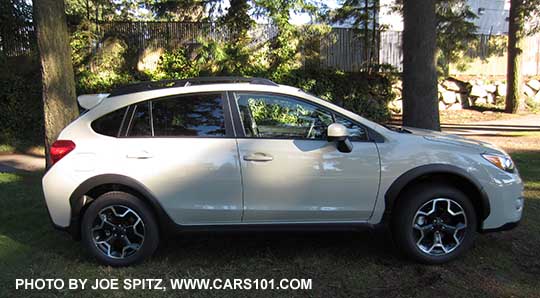 side view 2015 Crosstrek with optional rear spoiler, khaki color shown