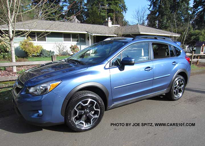 2015 Subaru Crosstrek, quartz blue color shown with optional body side moldings