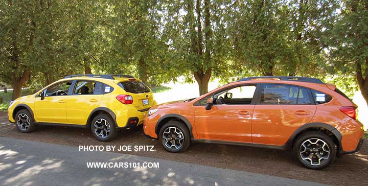 2015 Subaru Sunrise Yellow Crosstrek Premium Special Edition next to a Tangerine Orange Crosstrek