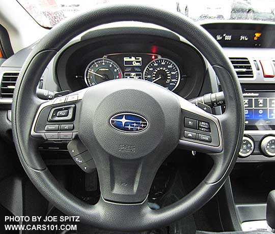 2015 Crosstrek Premium with optional Eyesight system vinyl wrapped steering wheel has 3 extra buttons lower left to control the Eyesight sounds and the center instrument cluster LCD display