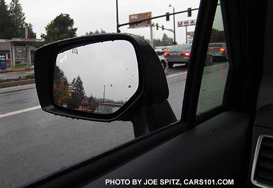 2016 Subaru Crosstrek blind spot detection flashes a yellow symbol in the outside mirrors