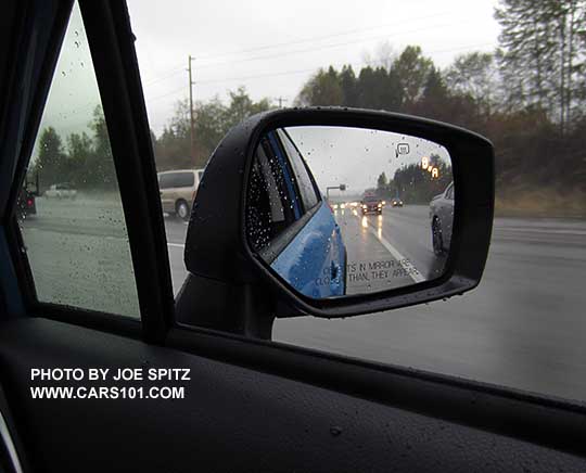 2016 Subaru Crosstrek blind spot detection flashes a yellow symbol in the outside mirrors