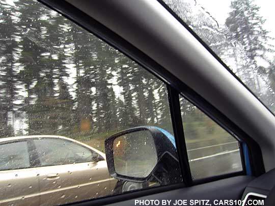 2016 Subaru Crosstrek blind spot detection flashes a yellow symbol in the outside mirrors