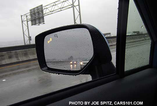 2016 Subaru Crosstrek blind spot detection flashes a yellow symbol in the outside mirrors