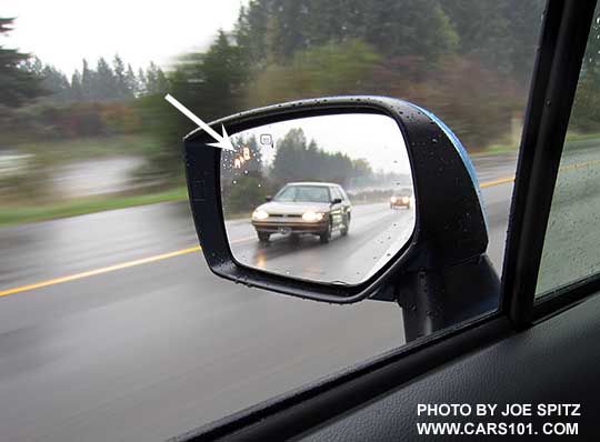 2016 Subaru Crosstrek blind spot detection flashes a yellow symbol in the outside mirrors