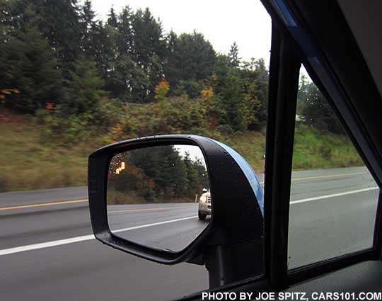 2016 Subaru Crosstrek blind spot detection flashes a yellow symbol in the outside mirrors