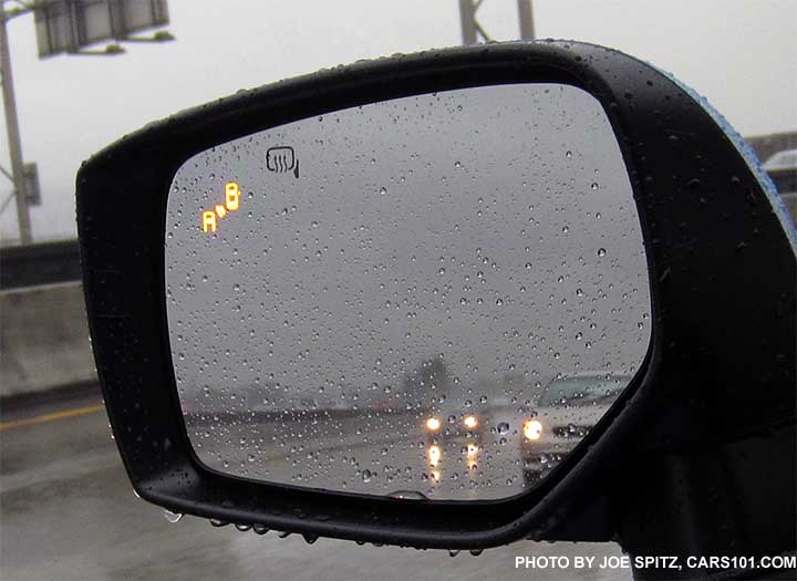 2016 Subaru Crosstrek blind spot detection flashes a yellow symbol in the outside mirrors