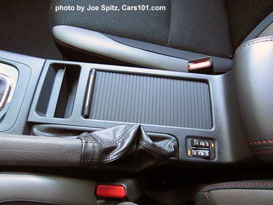 closeup of the  center console of the 2016 Crosstrek Premium Special Edition with retractable cupholder cover