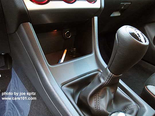 2016 Subaru Crosstrek center console, manual transmission, illuminated front storage bin, 12v outlet