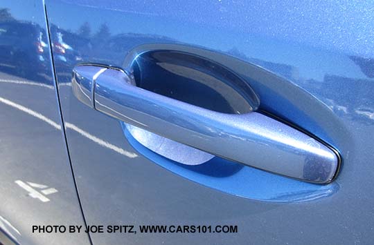 2016 Subaru Crosstrek 2.0 model body colored outside door handle, quartz blue shown