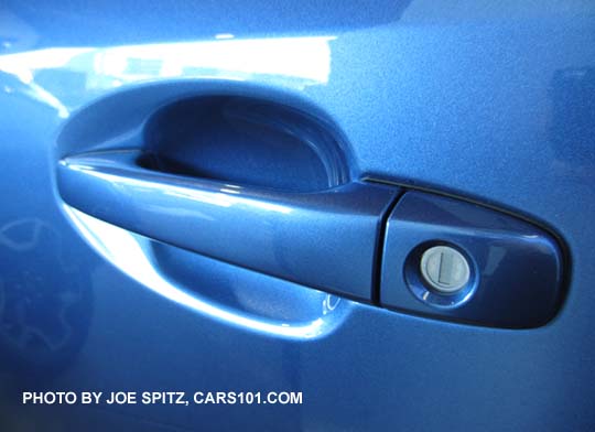 2016 Subaru Crosstrek 2.0 model body colored outside driver's door handle with key cylinder, quartz blue shown