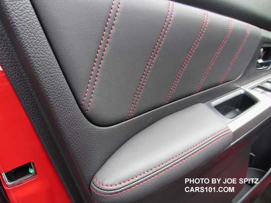 closeup of the 2016 Subaru Crosstrek Premium Special Edition driver's inner door panel with leatherette trim with red stitching