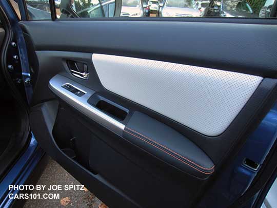 2016 Crosstrek front passenger inner door panel. Ivory leather with orange stitching shown.