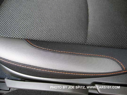 closeup of the 2016 Subaru Crosstrek Premium black cloth interior with orange stitching
