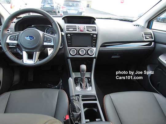 front dash view 2016 Subaru Crosstrek Limited gloss black dash trim. Black leather shown