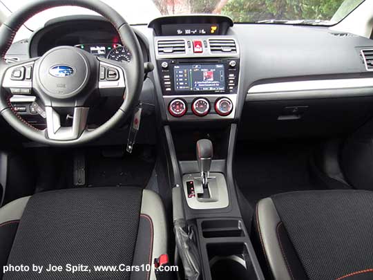 2016 Subaru Crosstrek Premium CVT with silver dash trim and shift surround, black cloth with orange stitching