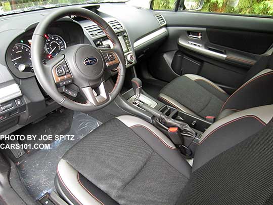 2016 Subaru Crosstrek Premium CVT with silver dash trim and shift surround, black cloth with orange stitching