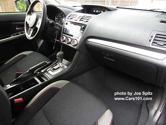 2016 Subaru Crosstrek Premium CVT with silver dash trim and shift surround, black cloth with orange stitching